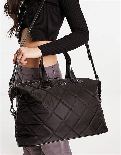 black quilted weekender bag.